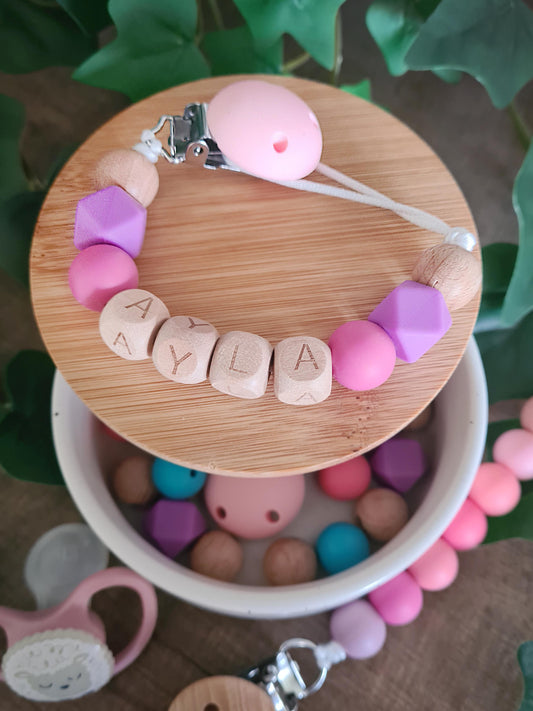 Personalised custom made soother clip. Add your Childs name to their dummy clip. Unique gift ideas for newborns and toddlers. Handcrafted Irish made.