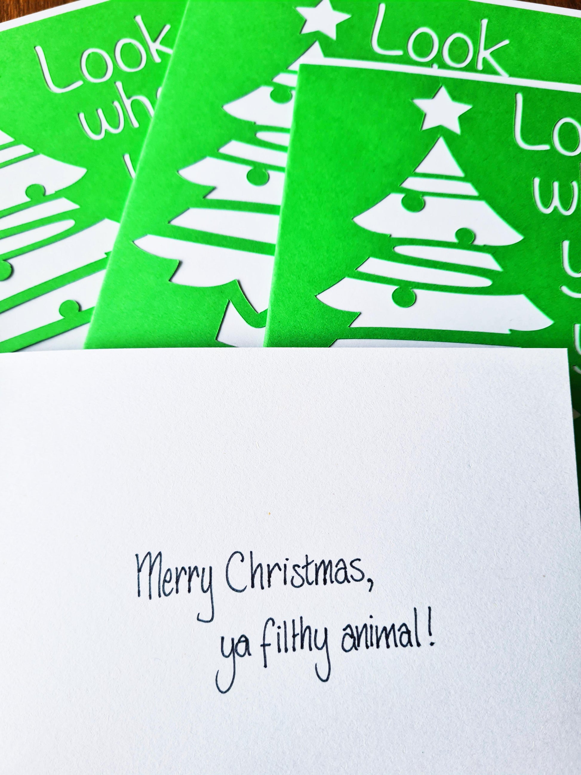 Green and white Home Alone inspired card with Christmas tree. Movie quotes