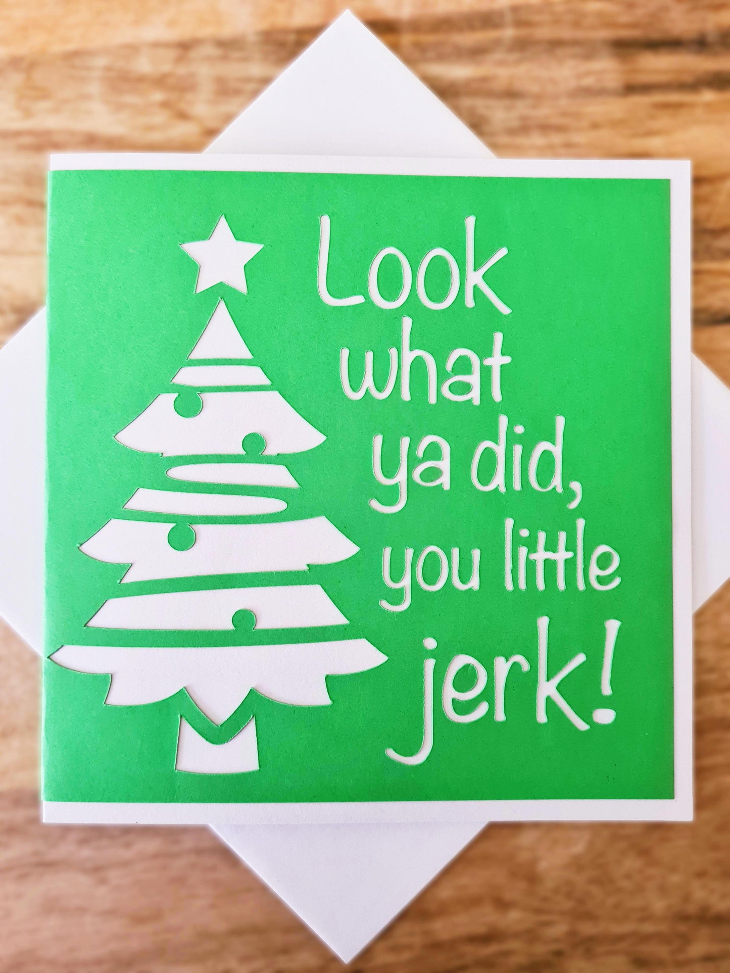 Green and white Home Alone inspired card with Christmas tree. Movie quotes