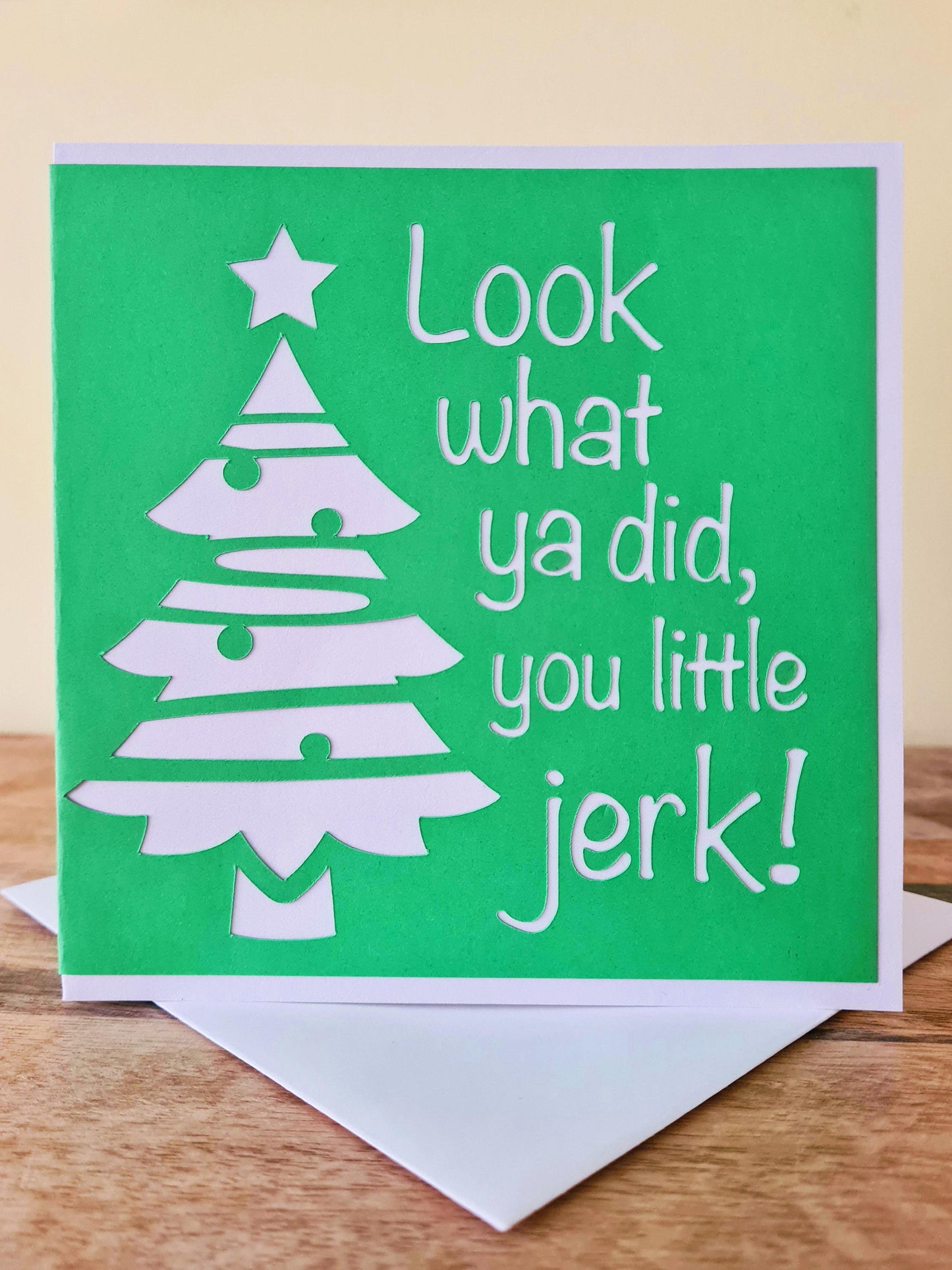 Green and white Home Alone inspired card with Christmas tree. Movie quotes