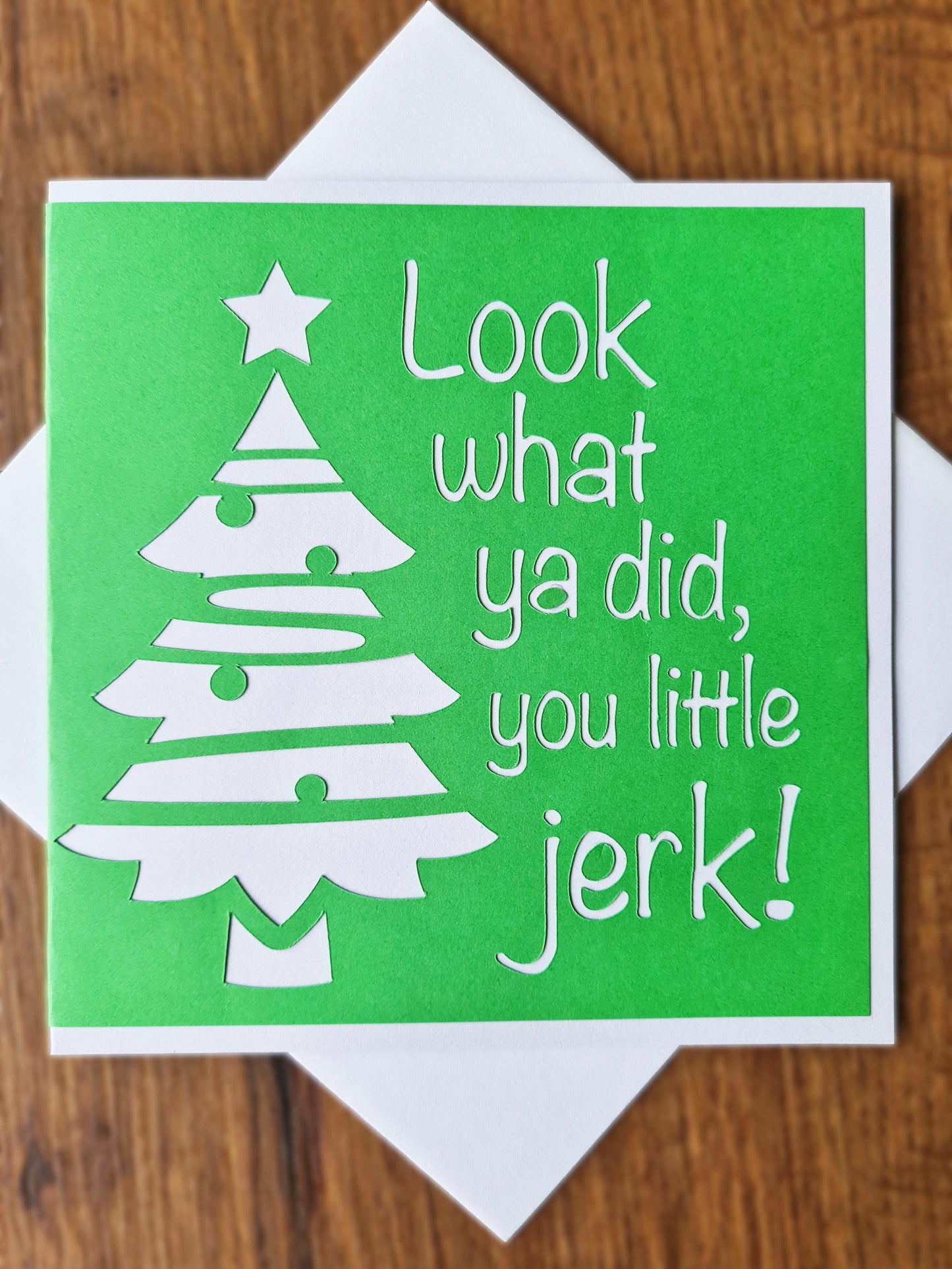 Green and white Home Alone inspired card with Christmas tree. Movie quotes